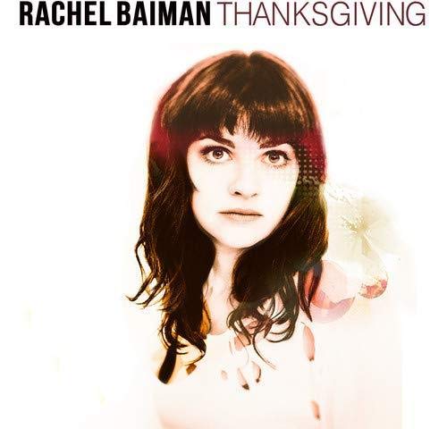 Vinyl record cover featuring a woman with long dark hair and bangs.