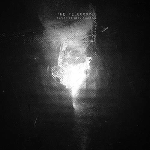 Black vinyl record cover with a bright, white, abstract light in the center.