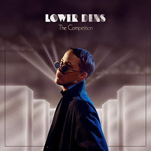 Album cover for "Lower Dens - The Competition" featuring a man in sunglasses.