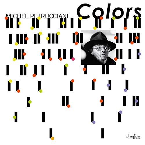 The image depicts a music album cover featuring a man with a hat, surrounded by scattered black rectangles and colorful dots.