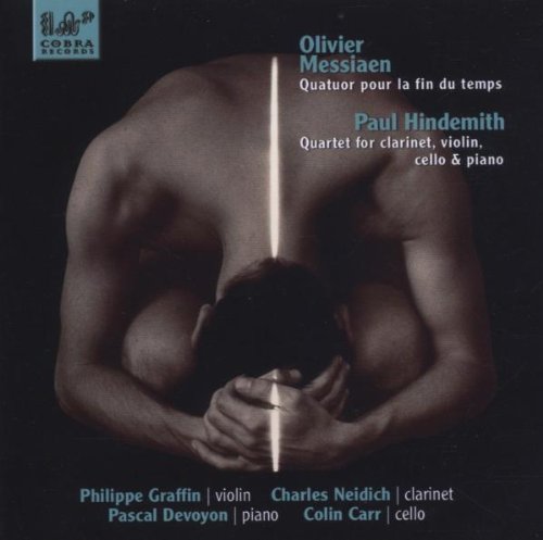 "CD cover with a man holding his head, black background, and blue logo."