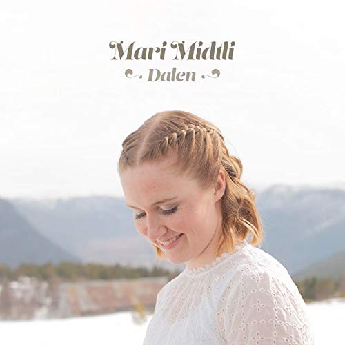 "Album cover featuring a woman in white with braided hair, outdoors."