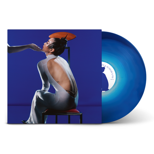 "Blue vinyl record with cover art featuring a woman sitting on a chair."