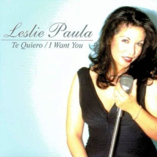 "Album cover featuring a woman in a black dress holding a microphone."