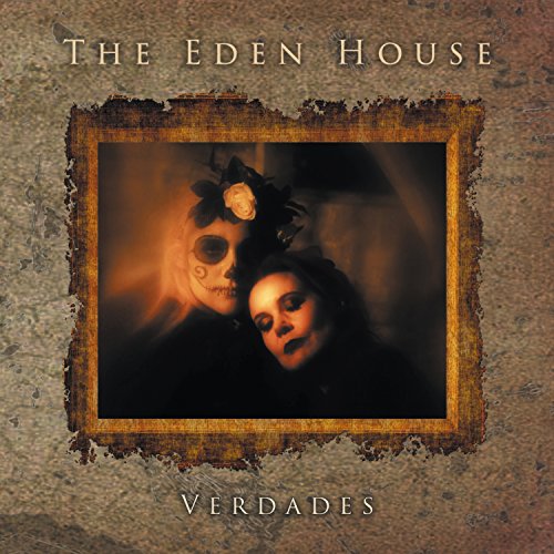 Vinyl album cover with a woman and a skull in a gold frame.