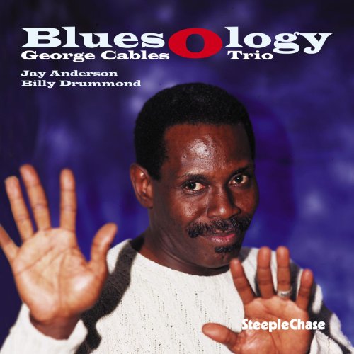 "Album cover featuring a man with short hair and mustache against a purple background."