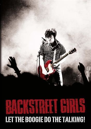 "Guitarist on stage with raised hands in foreground, red and white text overlay."