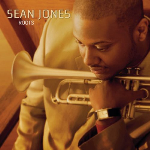 Man playing trumpet, wearing a watch, on a music album cover.