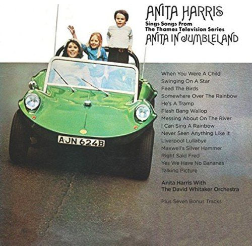 "Album cover with three people in a green car, listing song titles."