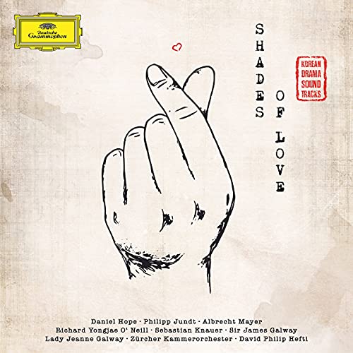 "Album cover with hand drawing and 'Shades of Love' text on beige background."