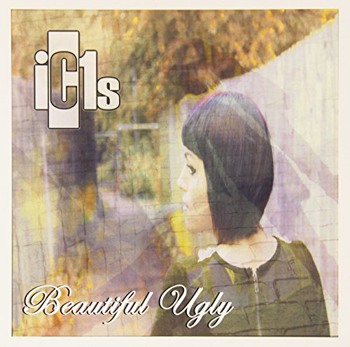 Vinyl album cover featuring a woman with short dark hair.