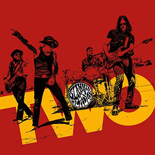 "Album cover with red background and yellow text, featuring a band performing."