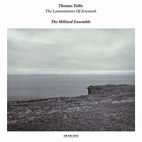 "Album cover with a black and white seascape image and white border."