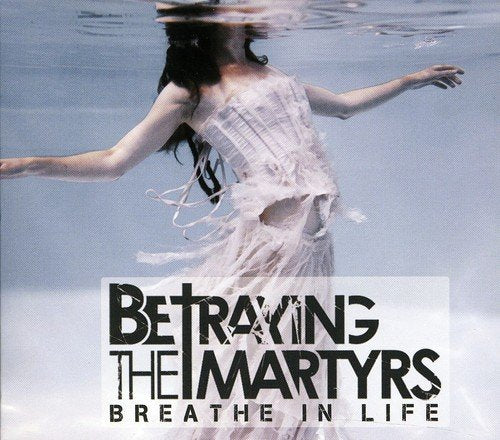 "Album cover featuring a woman submerged underwater in a white dress, with text overlay."