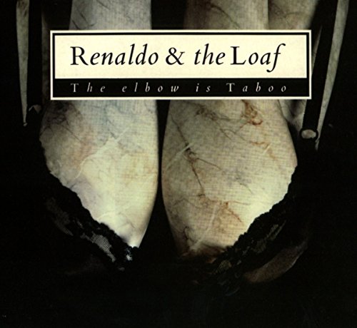 Album cover with two white, cracked, and torn objects against a black background.