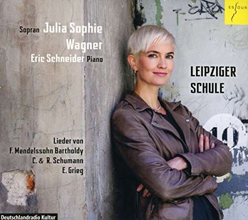 The image is a CD cover featuring a woman with short, platinum blonde hair, wearing a brown leather jacket.