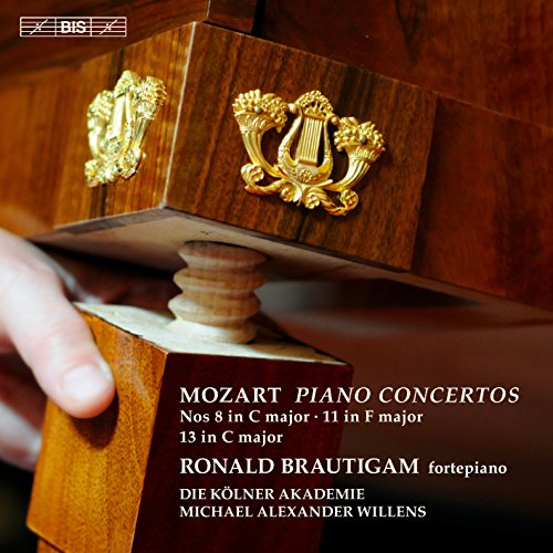 "CD cover with ornate wooden piano and text listing Mozart piano concertos."