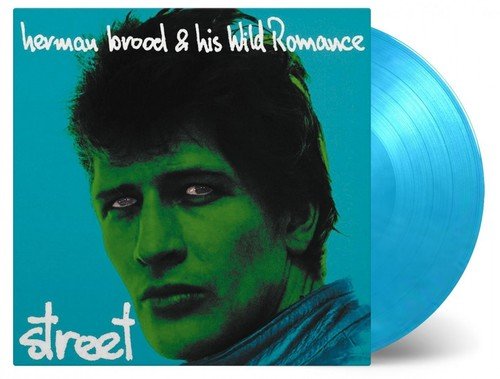 Album cover with a man's face, green and blue tones, and white text overlay.