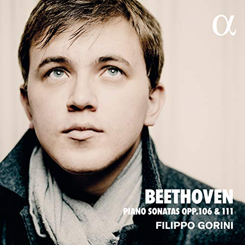 CD cover featuring a man with a light background and white text.