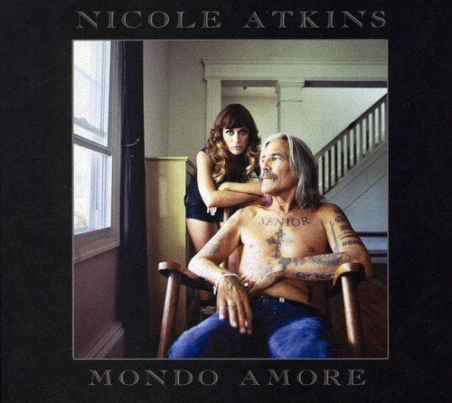 Nicole Atkins' album cover featuring a shirtless man and a woman behind him.