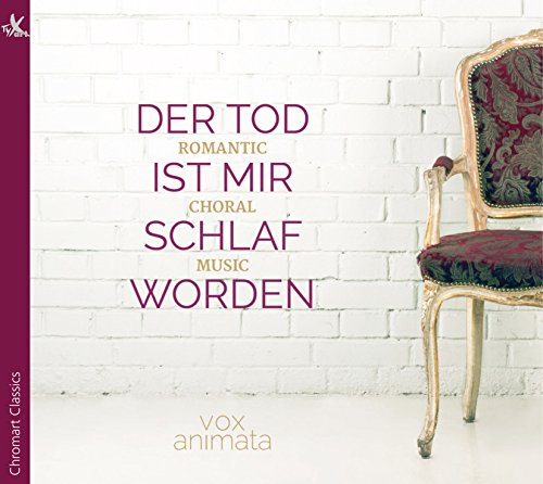 A CD cover featuring a chair beside a white brick wall with text overlay.