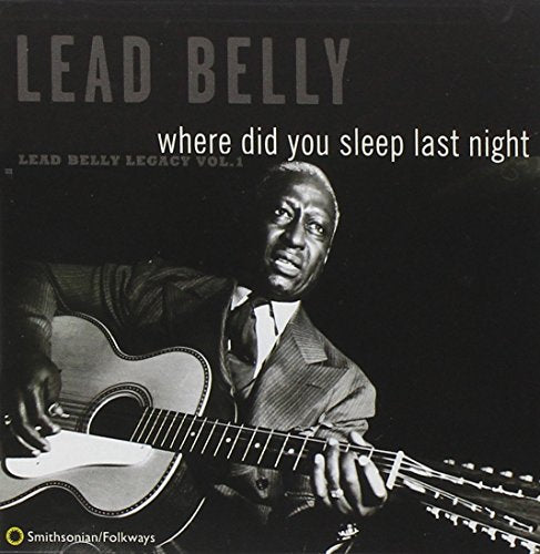 "CD cover featuring a black-and-white image of Lead Belly playing an acoustic guitar."