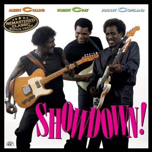 CD cover featuring three men playing guitars with "SHOWDOWN!" text at the bottom.