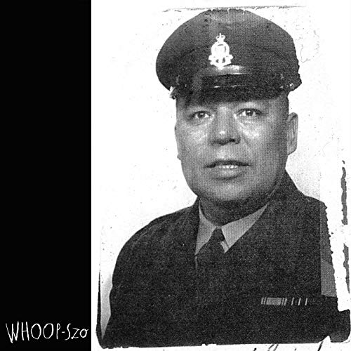 Black and white portrait of a man in a military uniform and cap.