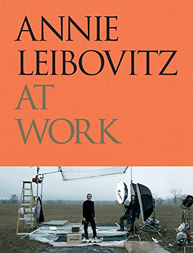 "Annie Leibovitz at Work" book cover with orange top and photography equipment image.