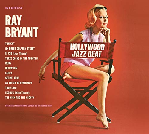 "Album cover with a woman sitting in a director's chair against a red background."