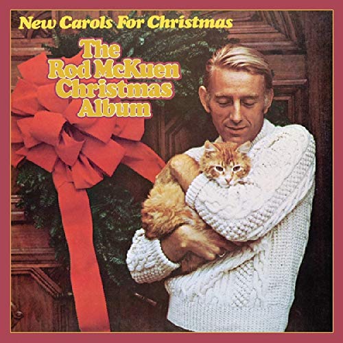 Album cover with man holding a cat beside a Christmas wreath on a door.