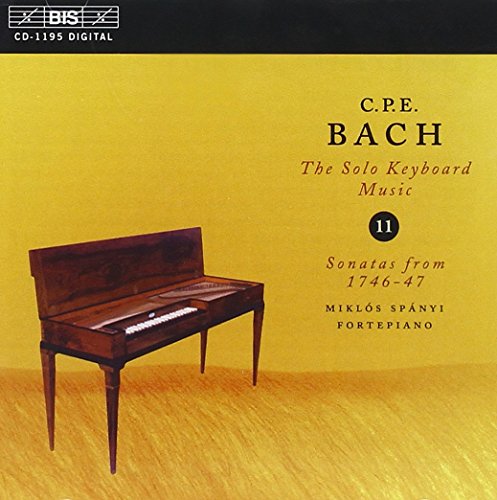 CD cover with a dark wooden piano on a yellow background.