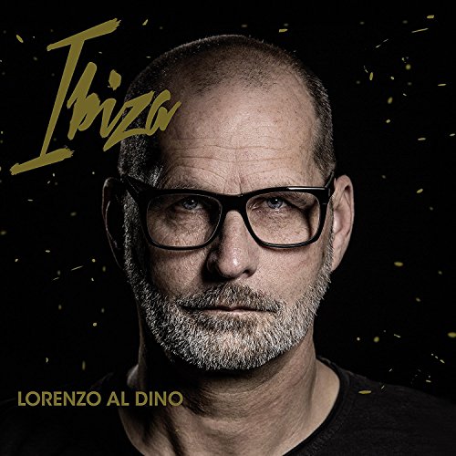 Man with glasses and salt-and-pepper beard on a black album cover.