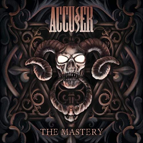 "Album cover featuring a skull with horns and glowing eyes, ornate dark background."