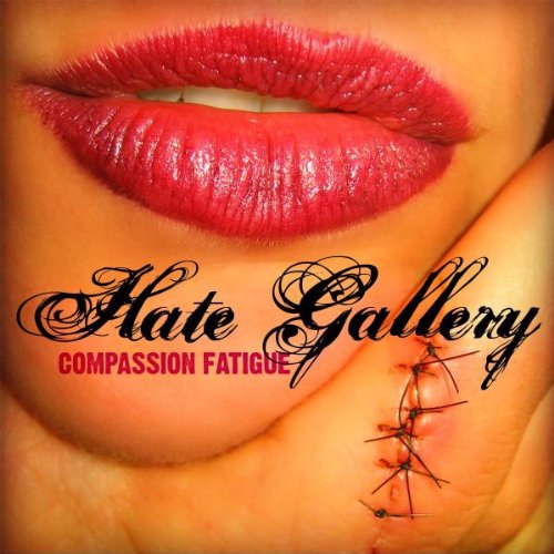 A close-up of lips with a stitched chin and text "Hate Gallery COMPASSION FATIGUE".