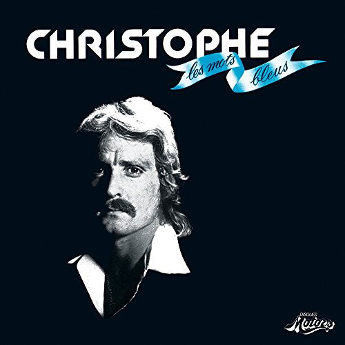 "Black-and-white portrait of a man with mustache on a dark blue album cover."