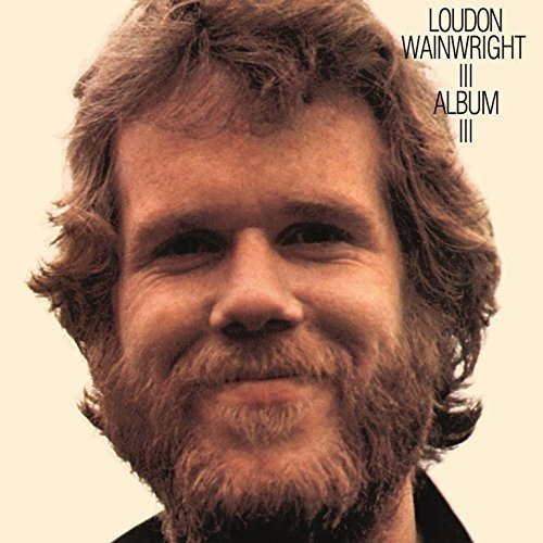 Album cover featuring a man with a beard and wavy hair, titled "Album III".