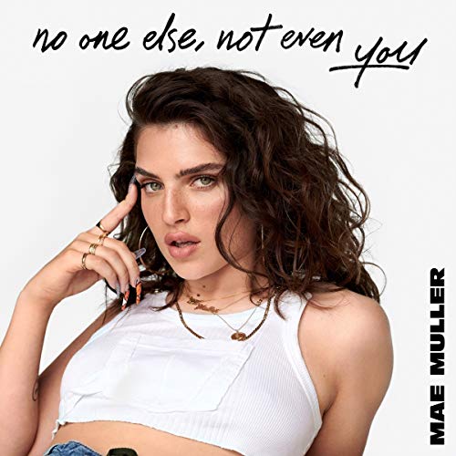Album cover featuring a woman with curly brown hair, wearing a white top.