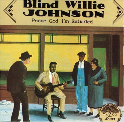 "Album cover art featuring a man playing guitar on a sidewalk."
