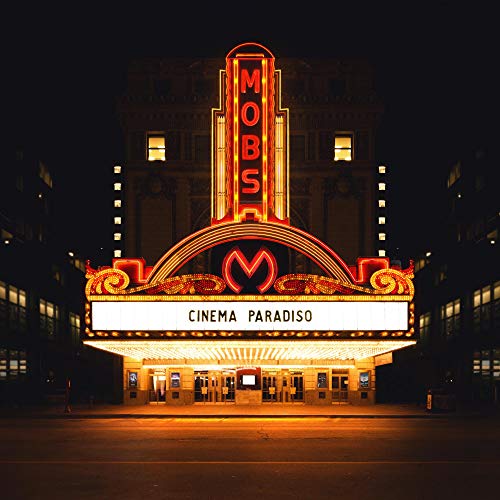 "Album cover featuring a lit-up movie theater marquee with 'Cinema Paradiso' displayed."
