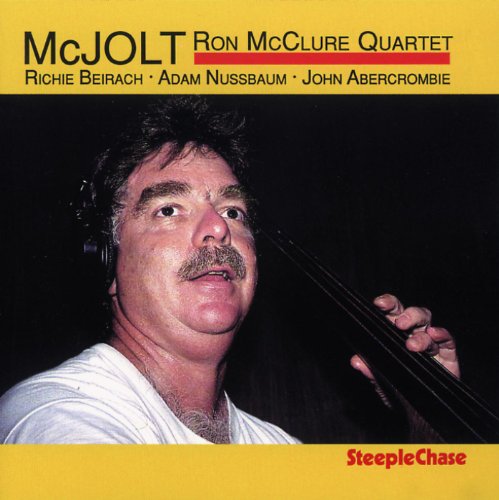 "CD cover featuring a man holding a double bass, yellow background, black and red text."