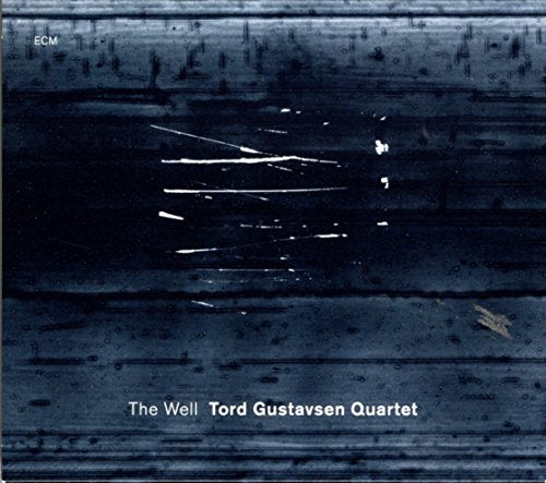 Dark blue abstract album cover with white text "The Well Tord Gustavsen Quartet".