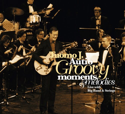 "CD cover featuring a man playing guitar with a band in formal attire."
