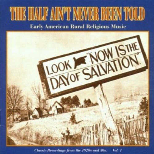 "CD cover with sepia-toned image of a sign in a rural landscape."