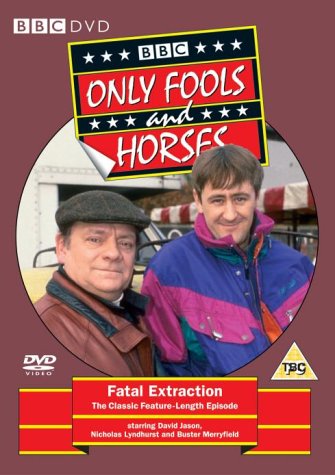 "Only Fools and Horses: Fatal Extraction DVD cover featuring two men in a circular image."