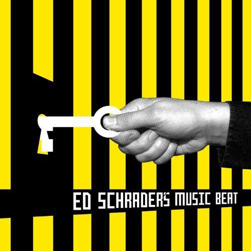 "Black and yellow striped album cover with hand holding a key."