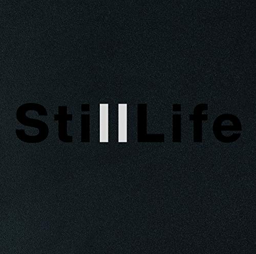 "CD cover with 'Still Life' text on a dark grey background."