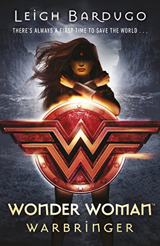 Book cover featuring Wonder Woman holding a glowing shield with a rocky background.