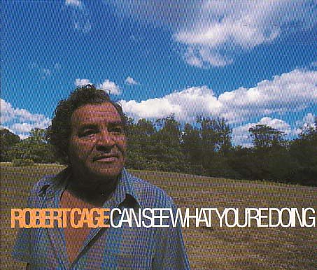 Album cover featuring a man in a field with text overlay reading "Robert Cage Can See What You're Doing".