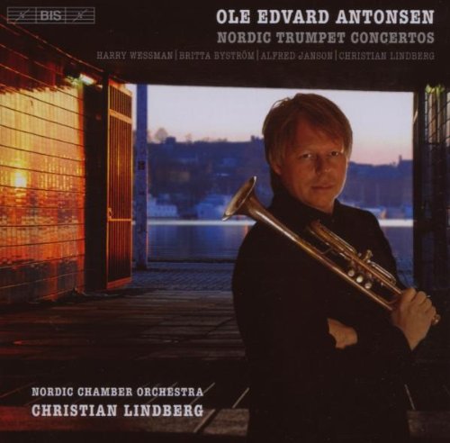 CD cover featuring a man holding a trumpet, outdoors at dusk.